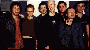 left to right: Adrian, Tim, Mark, Dave, Michael, Saul (scratching his chin) and Jim